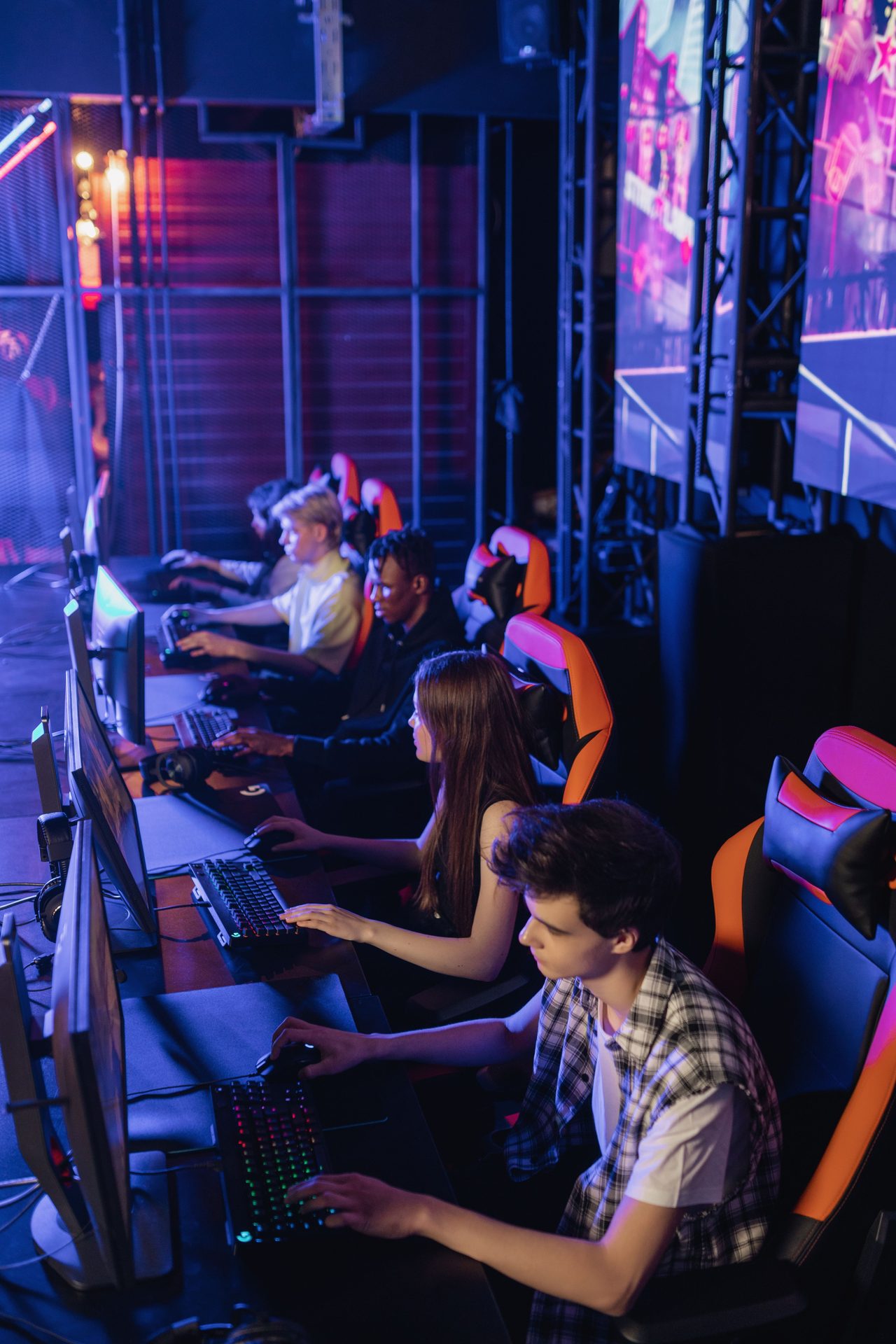 The Carrot corner practice seats with wide desks under warm neon trim